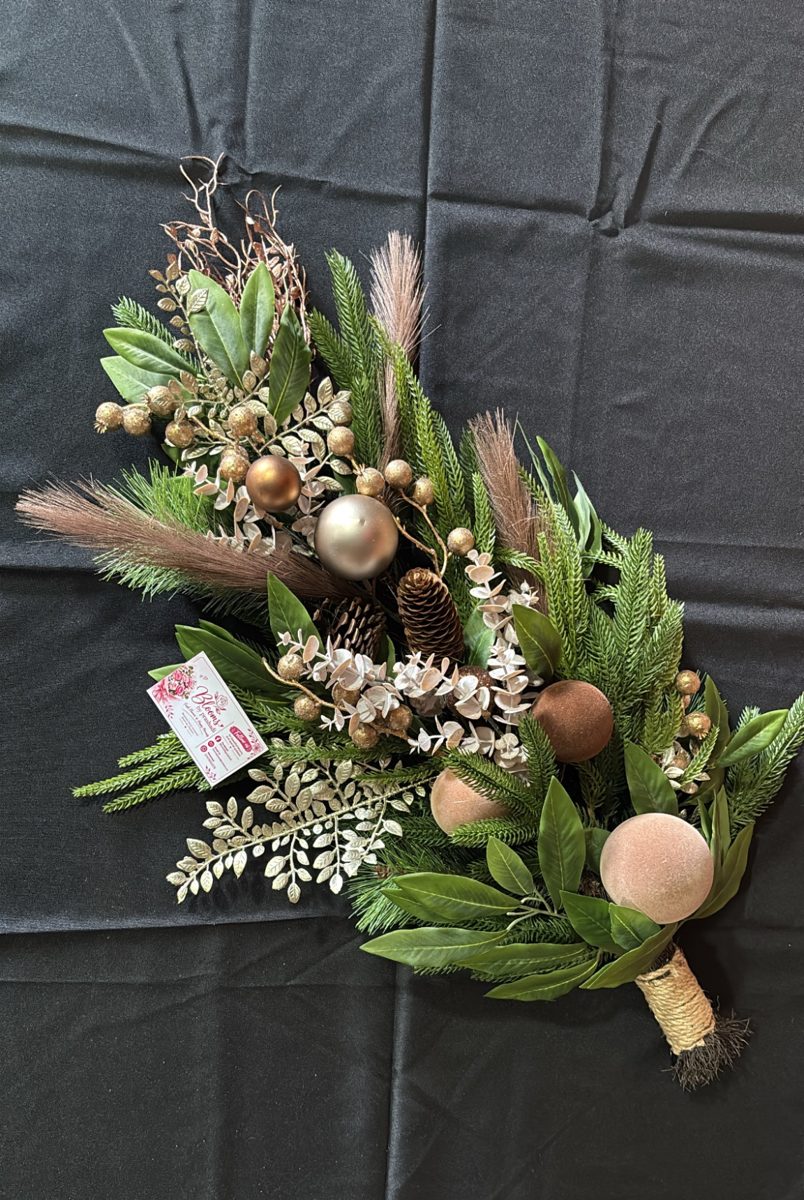 Christmas door swag of pine, gold and blush baubles, pine cones and pampas tied with twine